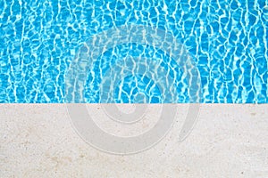 Art of swimming pool with blue water.Swimming pool bottom caustics ripple and flow with waves background