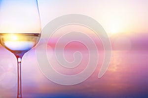 Art white wine on the summer sea background photo