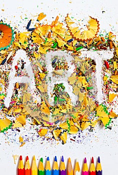 ART word on the background of colored shavings