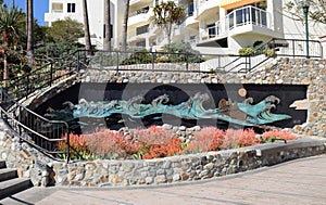 Art work at the north end of the boardwalk on Main Beach in Laguna Beach, California.