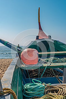 Arte Xavega typical portuguese old fishing boat on the beach in Paramos Espinho Portugal photo