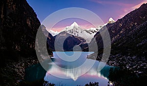 Artesonraju mountain reflected on lake paron