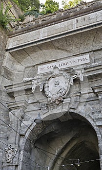 Artful ornaments over historic tunnel gate in Salzburg, Austria