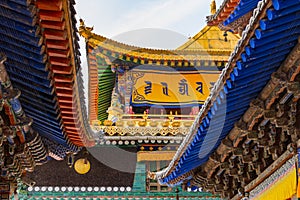 Artfully and colorfully decorated roofs and ornaments at Kumbum Jampaling Monastery, Xining, China