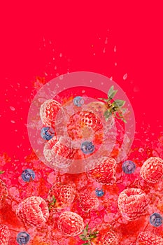 Artfully and lovingly designed photomontage with raspberries, blackberries, strawberries and water splashes in the