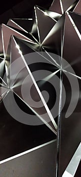 Arthouse, wall in the form of triangular pyramids with illumination.