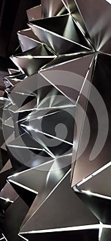 Arthouse, wall in the form of triangular pyramids with illumination.