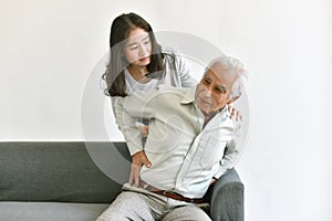 Arthritis joint pain problem in old man, Elderly asian man with hand on hip gesture.