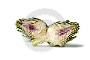 Artichoke - Green Artichoke `Carciofo` Cut Open On White Background photo