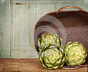 Artichokes spilling out of a basket