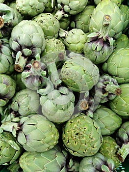 Artichokes vegetables background fresh green farmers market fresh food eating healthy. Alcachofa photo