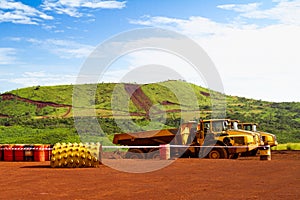 Articulated haul trucks on mine site in Africa photo