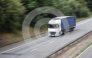 Articulated lorry in motion on the road