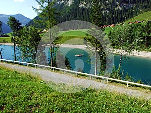 Artifical lake Ganglesee or Gaenglesee on the Valunerbach or Valuenerbach stream and in the Saminatal