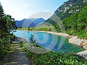 Artifical lake Ganglesee or Gaenglesee on the Valunerbach or Valuenerbach stream and in the Saminatal