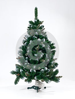 Artificial christmas tree on a white background