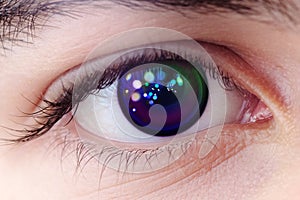 Artificial close-up Eye Cyborg face of mechanical robot, future with puirple glow