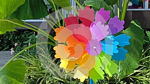 Artificial colorful windmills for decorating a small garden