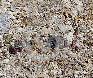 Artificial conglomerate rock on a medieval building
