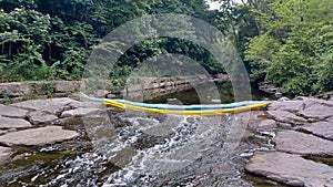 Artificial dam on a shallow river