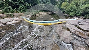 Artificial dam on a shallow river