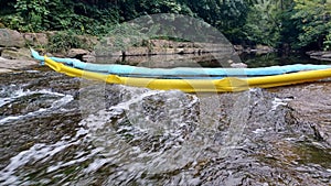 Artificial dam on a shallow river