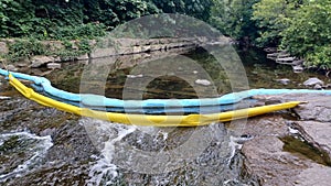 Artificial dam on a shallow river