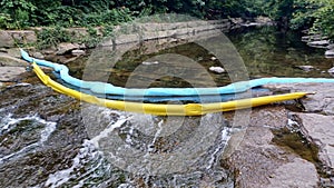 Artificial dam on a shallow river