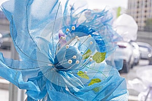 Artificial decorative blue flowers