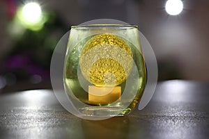 An artificial decorative candle in the shape of a sphere