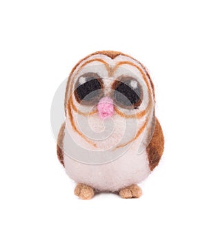 Artificial felt owl toy.