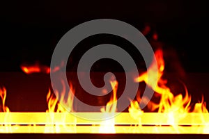 Artificial fireplace. Burning logs. Decorative fire