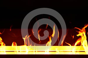 Artificial fireplace. Burning logs. Decorative fire