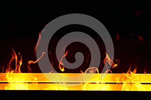 Artificial fireplace. Burning logs. Decorative fire