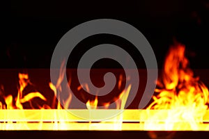 Artificial fireplace. Burning logs. Decorative fire