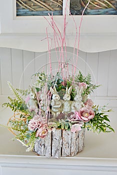 Artificial flower arrangements with rabbits