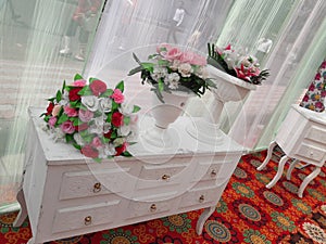 Artificial flower placed on table