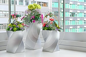 Artificial flowers in vases