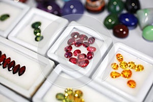 Artificial gems on plastic box in jewelry store