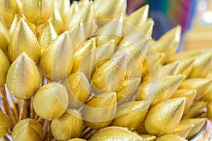 Artificial gold lotus on vase for sacrifice to buddha