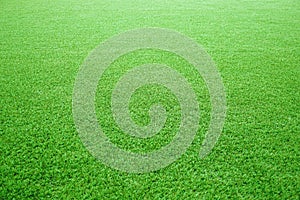 Artificial grass of football field, Green lawn for texture background.