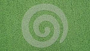 Artificial grass, Green lawn for texture background, Top view.