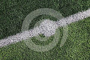 Artificial grass green texture of football field Small, top view artificial grass futsal ball field in gym indoor, Soccer sport fi