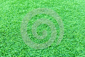 Artificial green grass or astroturf for background photo