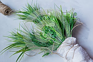 Artificial green grass with brown thread