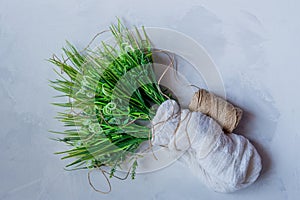 Artificial green grass with brown thread