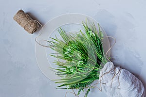 Artificial green grass with brown thread