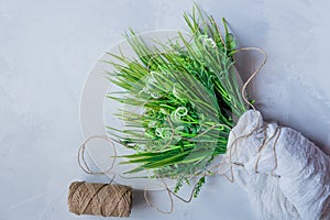 Artificial green grass with brown thread