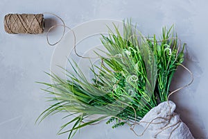 Artificial green grass with brown thread