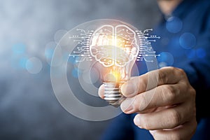 Artificial intelligence innovation and creative technology idea concept with glowing brain light bulb